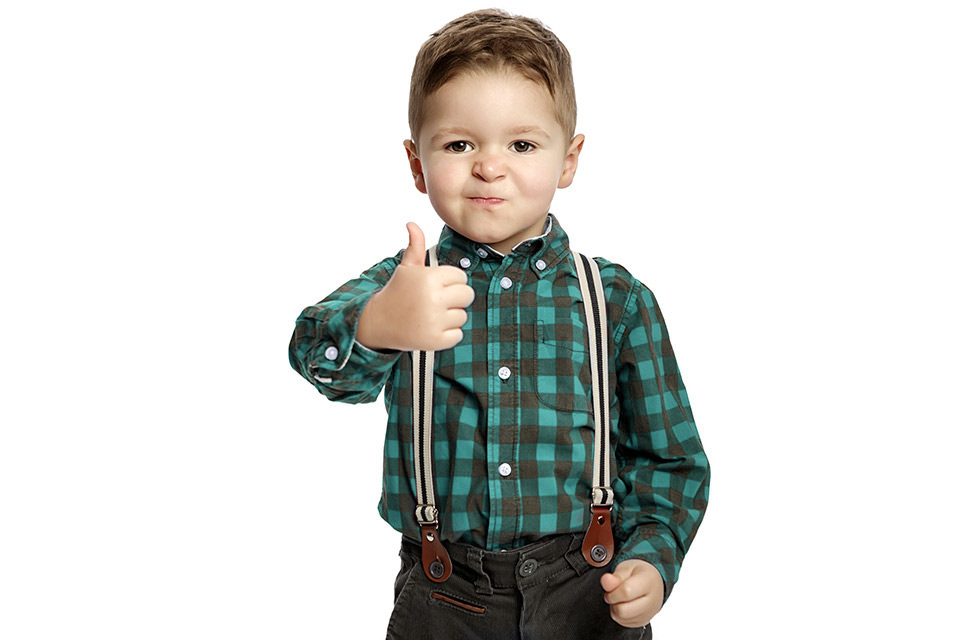Kid with thumb up - image